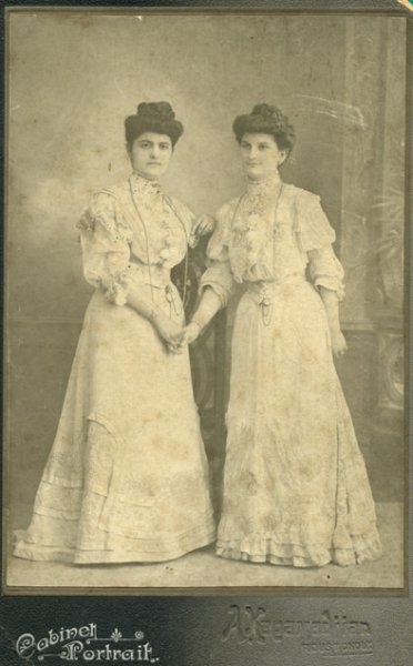 untitled (studio portrait of two young women (sisters?) in white gowns)