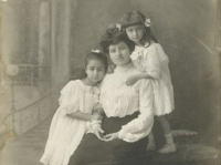 Untitled (studio portrait of a mother with her two young daughters)