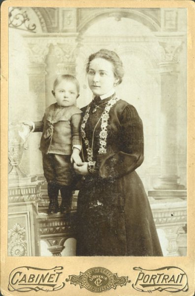 Untitled (studio portrait of a young mother with her child)