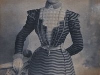 Portrait of a young woman in striped dress