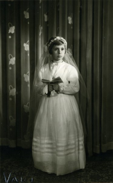 Untitled (studio portrait of a girl in communion dress)